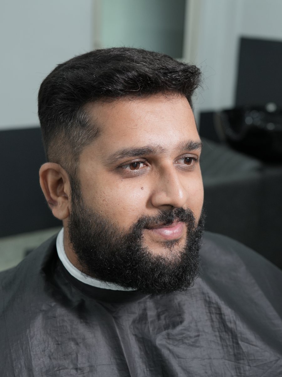 The same man after hair fixing at Relookz: full natural-looking hair across the top, cut and styled to his face.